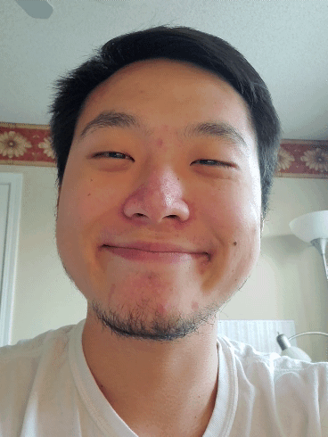 Bryan giving a quick smile